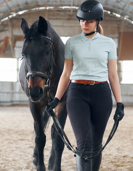ready-for-training-a-young-woman-in-jockey-clothe-2022-06-06-17-04-23-E335HD9
